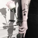 Black rose tattoo by Johnny Gloom
