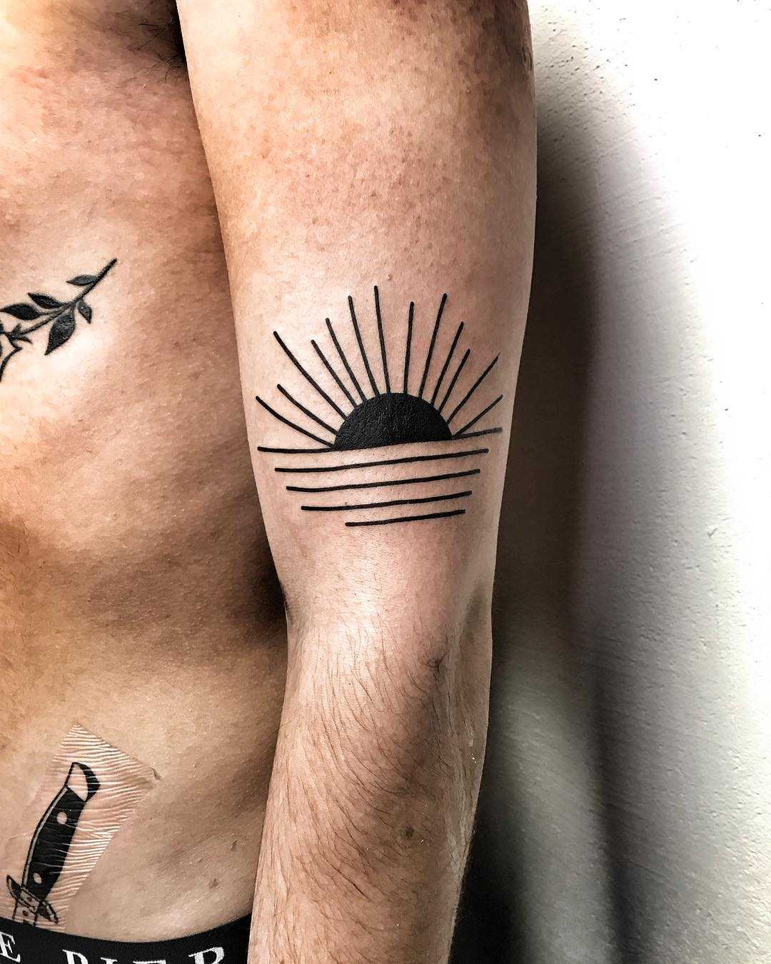 Black sunset tattoo by Mike Nofuck