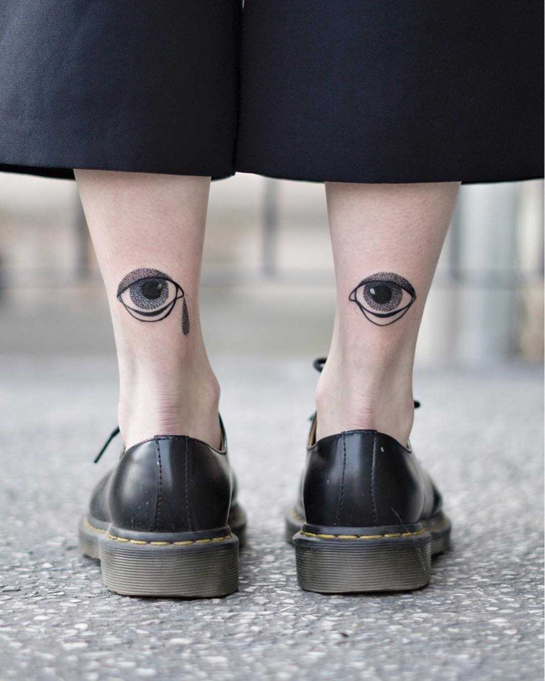 Blackwork eye tattoos by Dżudi Bazgrole