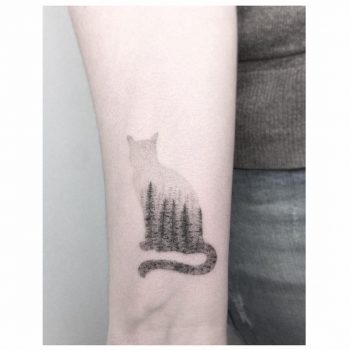 Cat and forest tattoo by Jakub Nowicz