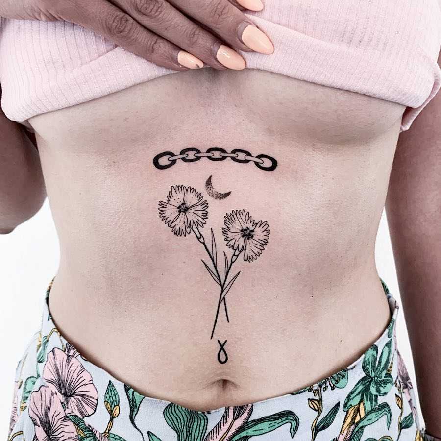 Chain link and flowers by Julim Rosa inked on the center of the belly Relat...