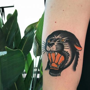 Classic panther tattoo by Łukasz Krupiński