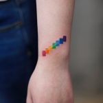 Cover up rainbow tattoo by Aki Wong