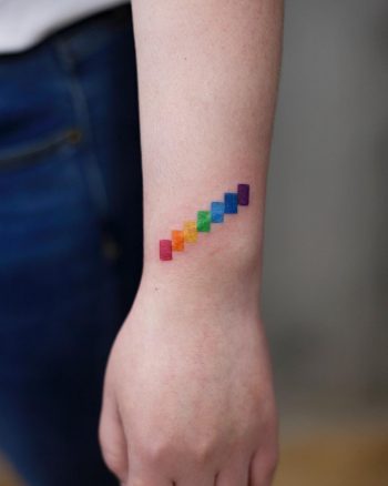 Cover up rainbow tattoo by Aki Wong