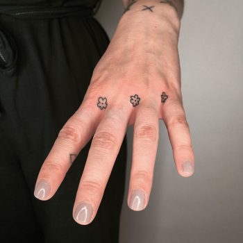 Cute flower tattoos by Jessica Rubbish