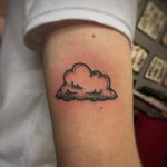 Cute little cloud tattoo by Kirk Budden