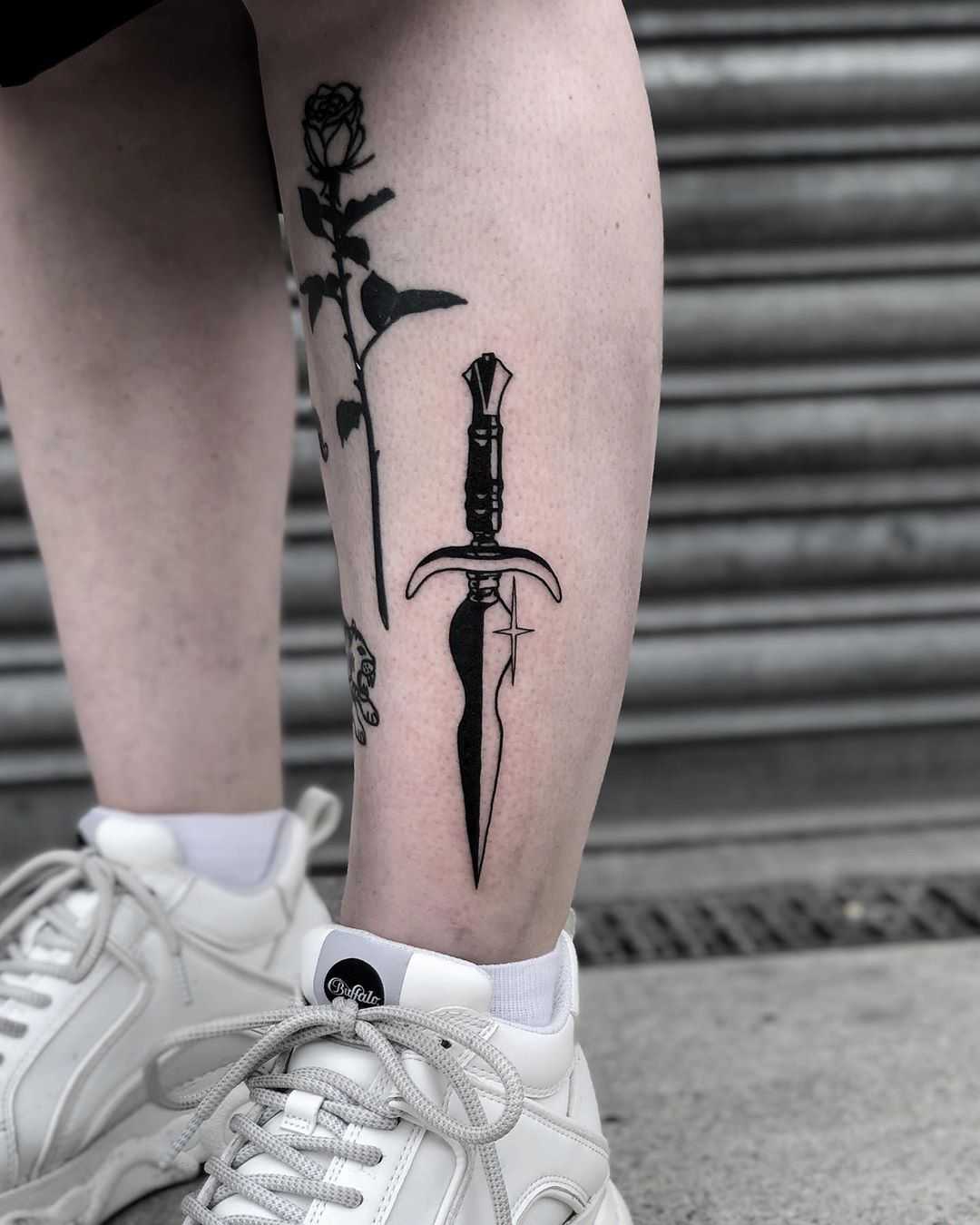 Dagger tattoo by Loz McLean
