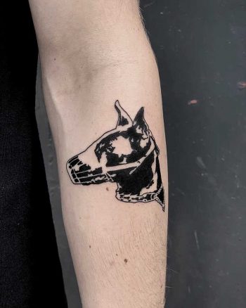 Doberman tattoo by Loz McLean