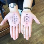Dots on palms by Kirk Budden