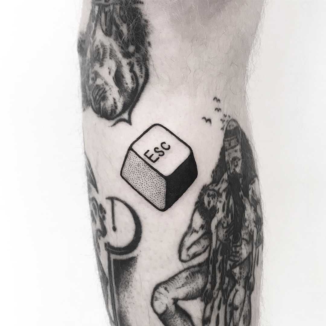 Escape button tattoo by Pulled Poltergeist