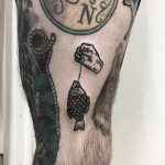 Fish tattoo on a thigh by Deborah Pow