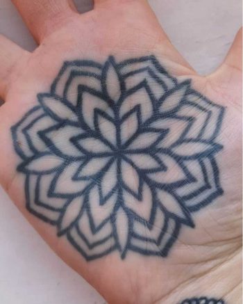 Flower tattoo on a palm by Luke.A.Ashley