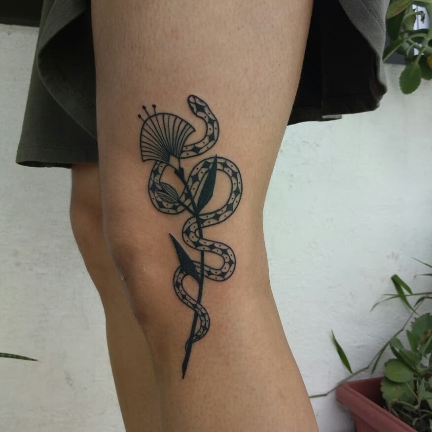 Ginkgo leaf and snake tattoo by artist Meritattoon