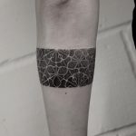 Hand-poked armband by Oliver Whiting