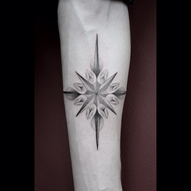 Hand-poked compass rose by Oliver Whiting