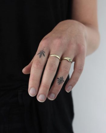 Hand-poked finger ornaments by Lara Maju
