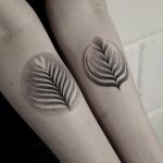 Hand-poked rosetta tattoos by Oliver Whiting