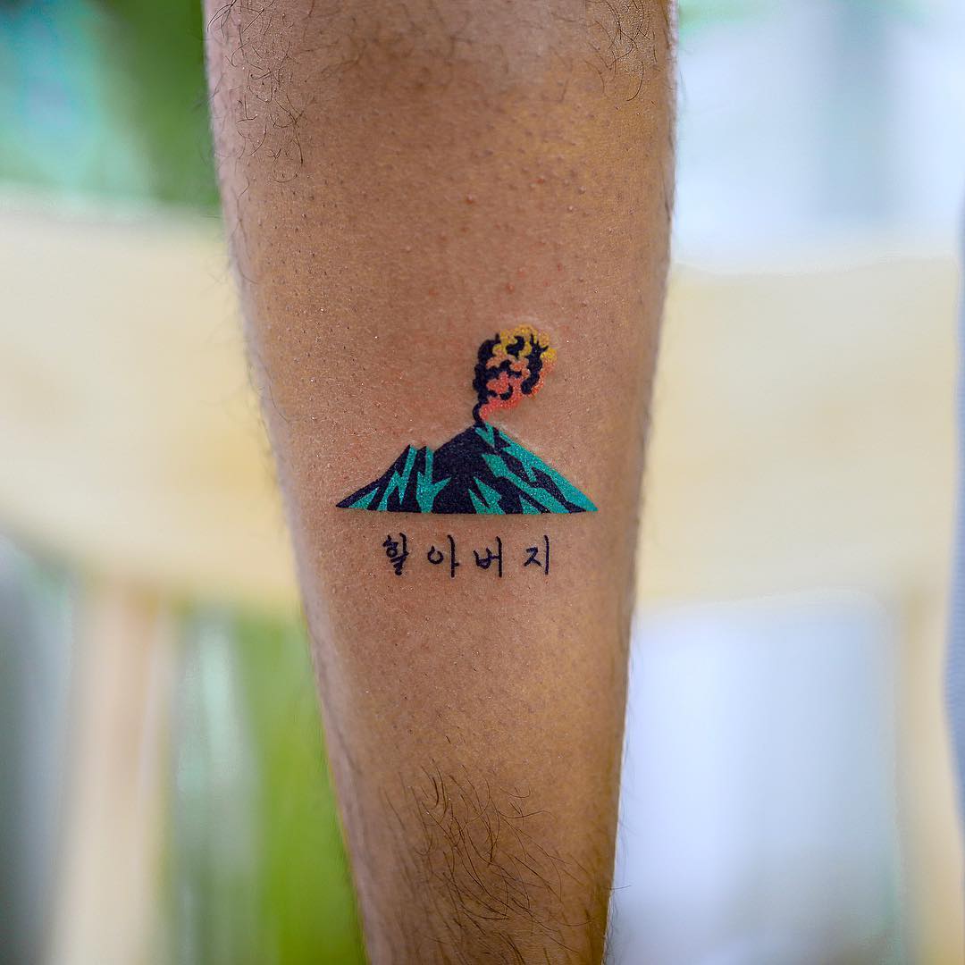 Hand-poked volcano tattoo by zzizziboy