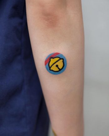 Jingle bell tattoo by Aki Wong