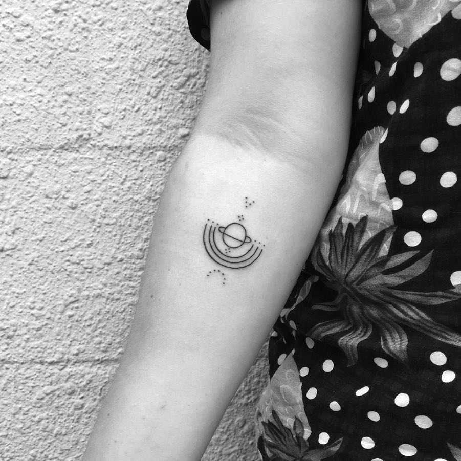 Little Saturn tattoo by Nadia Rose
