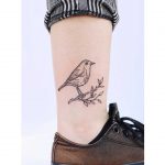 Little robin tattoo by artist Zaya