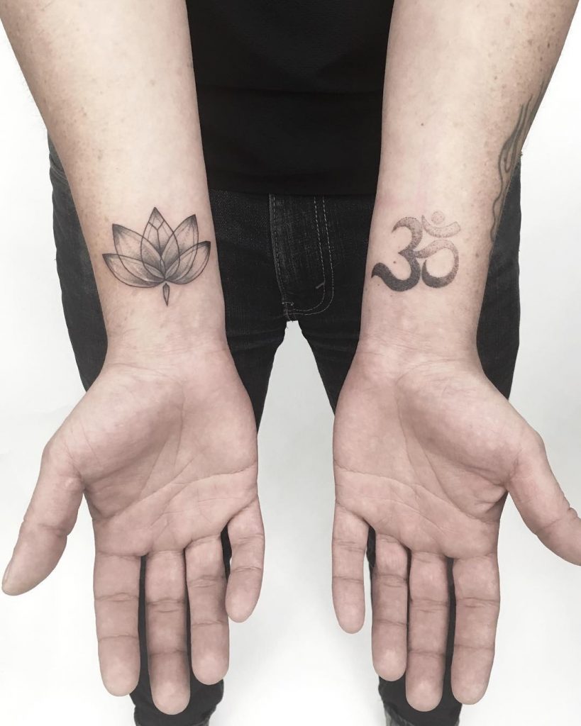 Lotus and om tattoos by Gianina Caputo