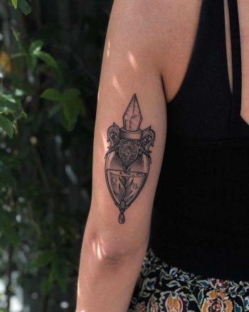Magic perfume bottle tattoo by Lozzy Bones
