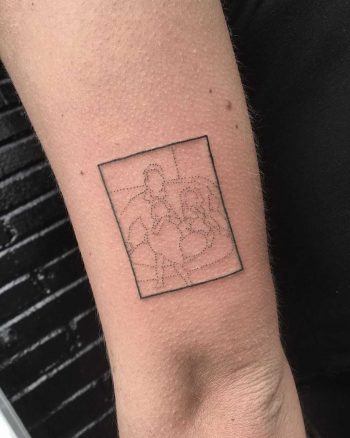 Minimal portrait tattoo by Robbie Ra Moore