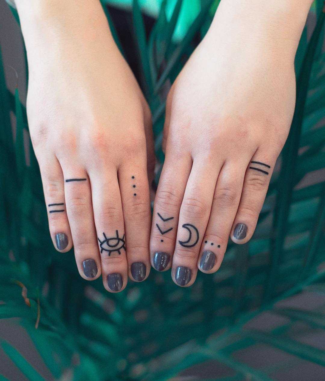 Minimalist finger tattoos by Dżudi Bazgrole
