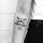 Mountains within flowers tattoo by Nadia Rose