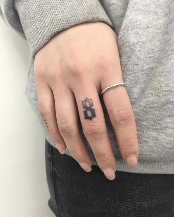 Number 8 tattoo by Gianina Caputo