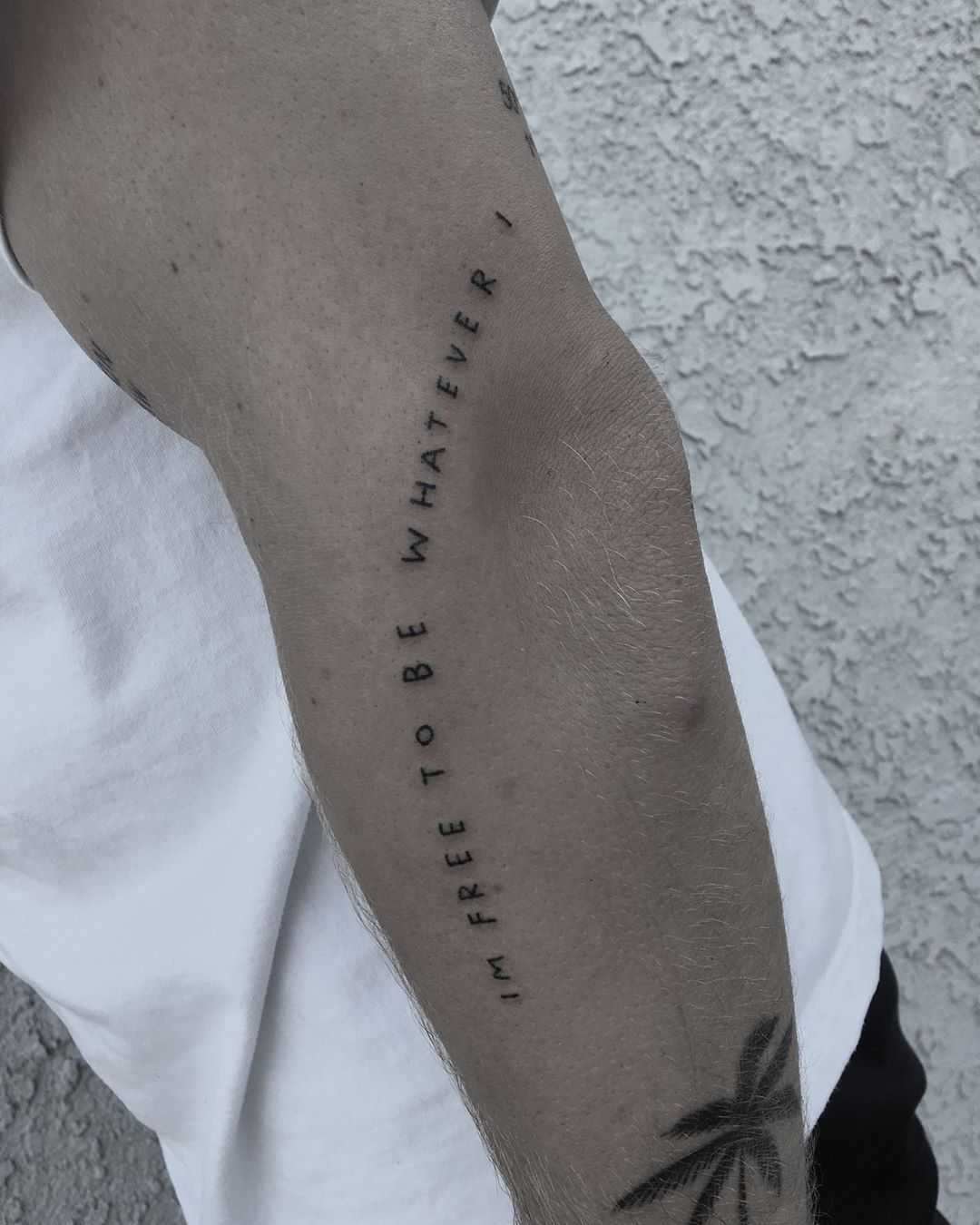 Oasis lyrics tattoo by Robbie Ra Moore