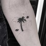 Palm tree tattoo by Robbie Ra Moore