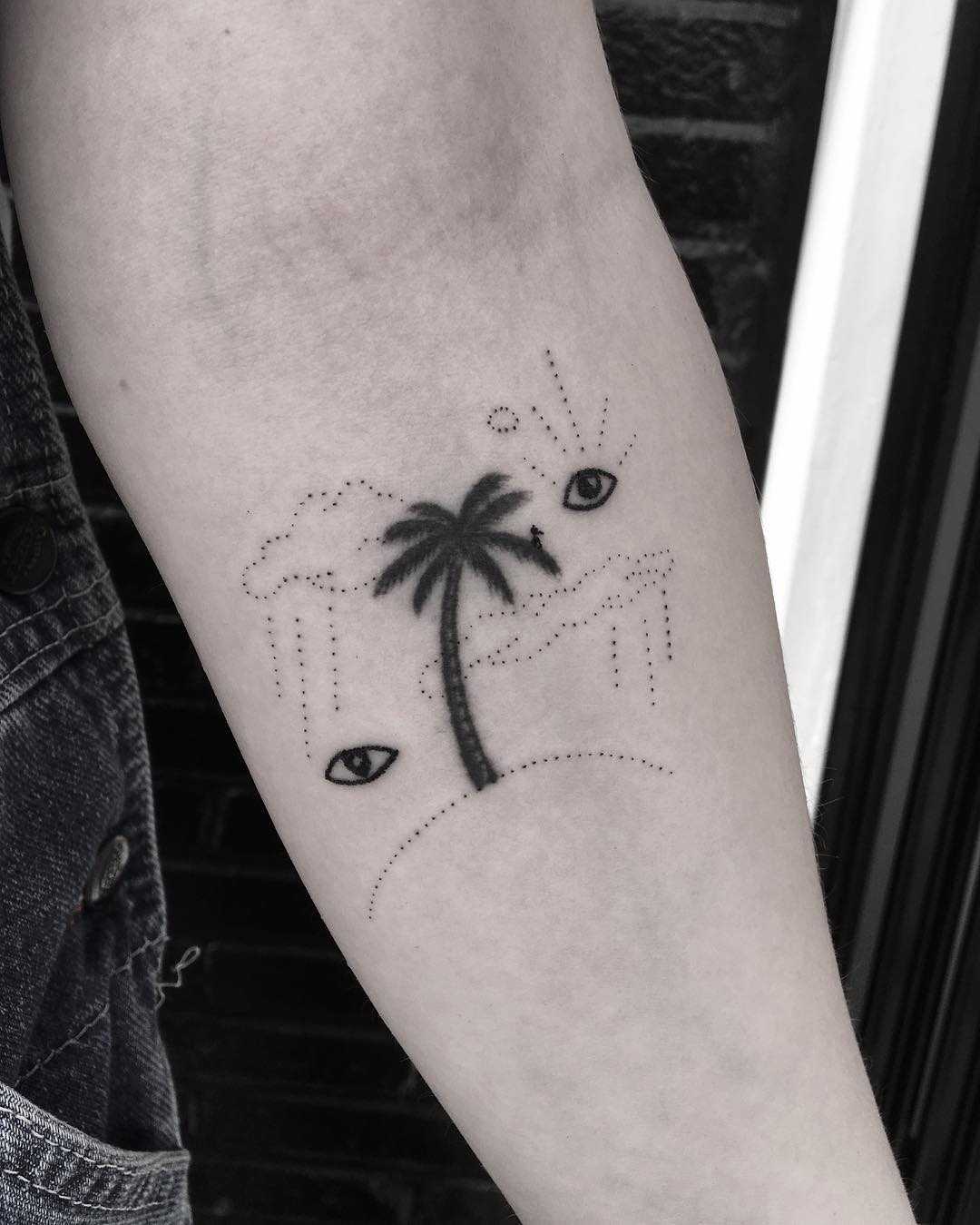 Palm tree tattoo by Robbie Ra Moore
