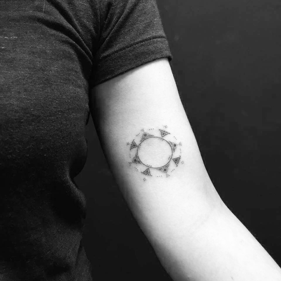 Patterned circular tattoo by Nadia Rose