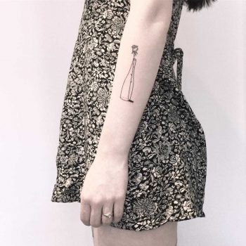 Rose in a bottle tattoo by Chinatown Stropky