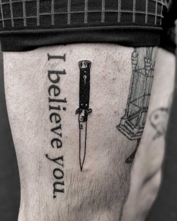 Script tattoo by Zaya and knife by Loz McLean