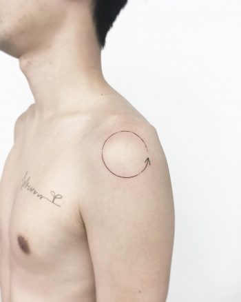 Small perfect circle tattoo by Gianina Caputo