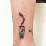 Snake in a vase tattoo by Agata Agataris