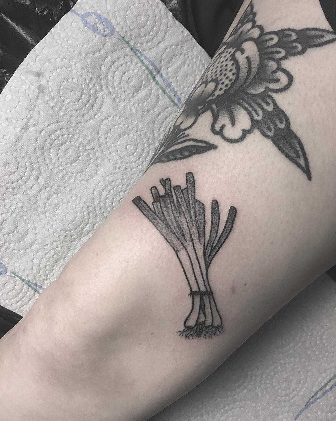 Spring onions tattoo by tattooist Spence @zz tattoo
