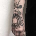 Stylized sun by tattooist Spence @zz tattoo