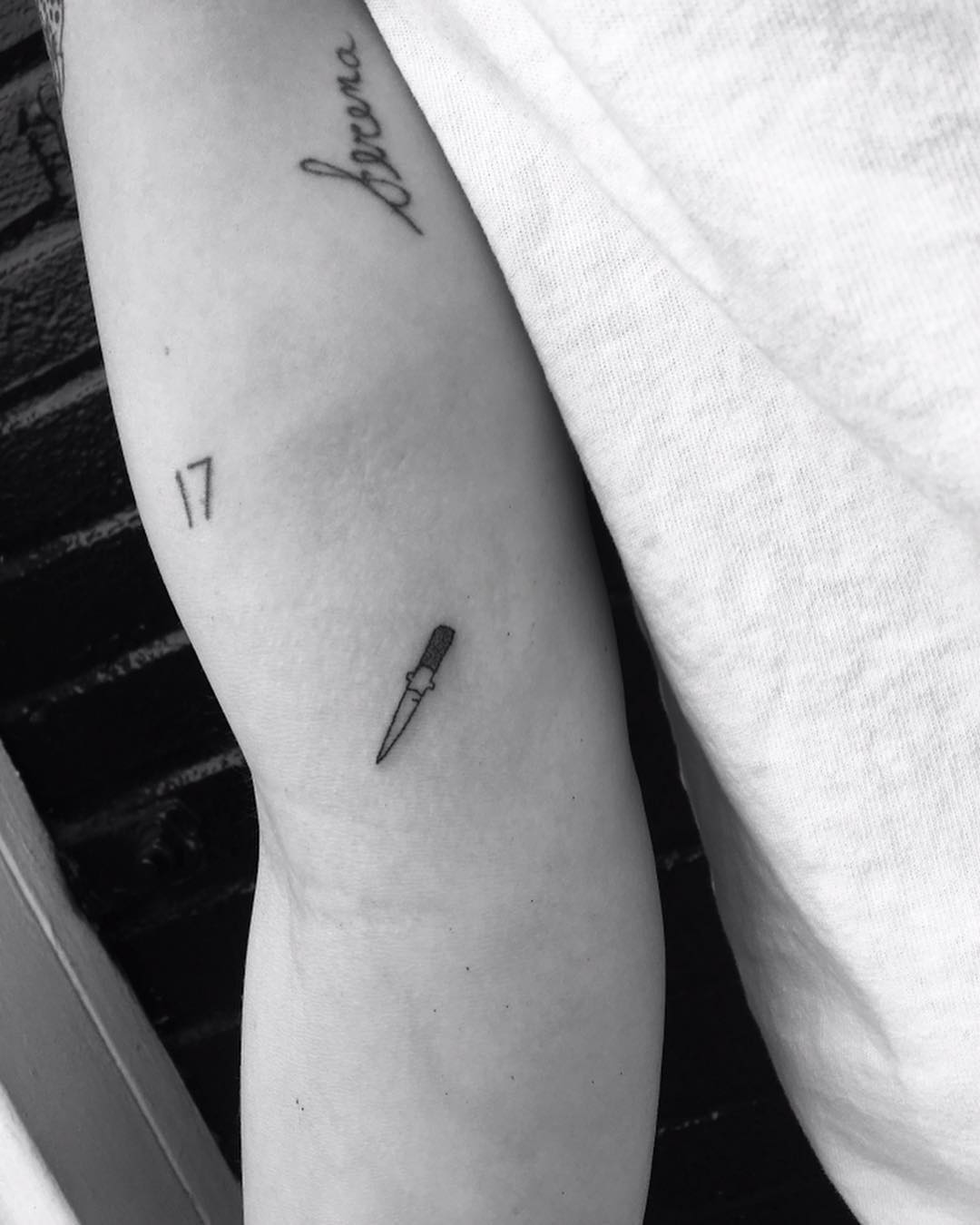 Super tiny dagger tattoo by Robbie Ra Moore