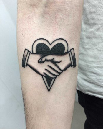Traditional handshake tattoo by Łukasz Krupiński