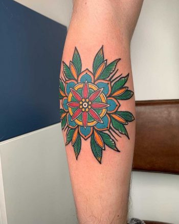 Traditional mandala flower tattoo by Lara Simonetta