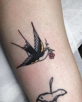 Traditional swallow tattoo by Łukasz Krupiński