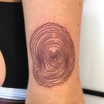 Tree ring tattoo by Agata Agataris
