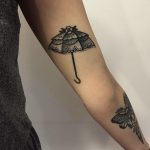 Umbrella tattoo by tattooist Miedoalvacio