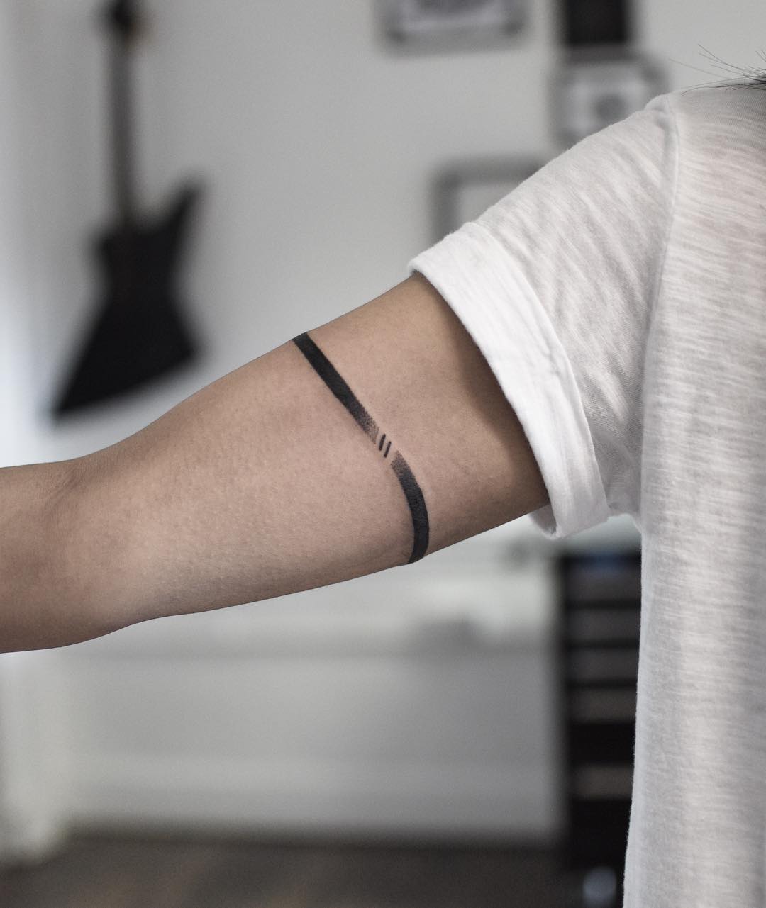 Wavy armband tattoo by Wagner Basei