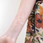 White patternsnake tattoo by Ann Gilberg