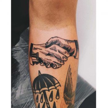 Woodcut handshake tattoo by tattooist Zaya